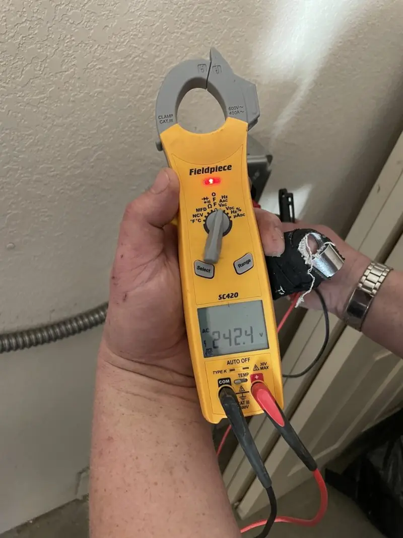 Voltage testing with clamp meter during Aluminum Wiring Replacement in Ozark